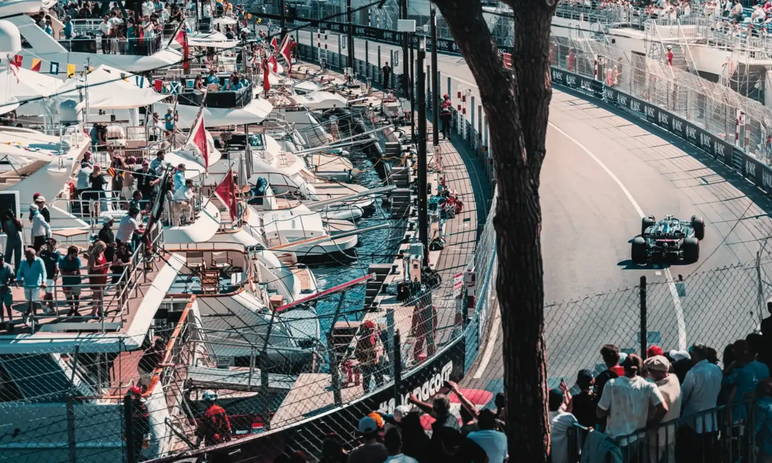 Luxurious Paddock Club suite with direct trackside view at Monaco Grand Prix.