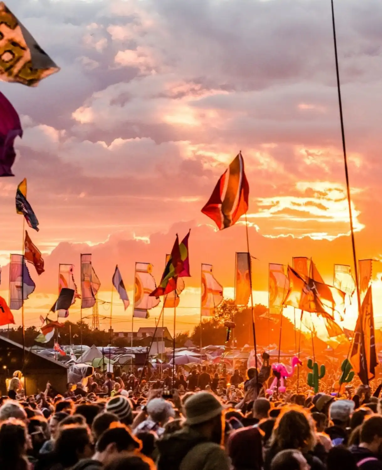 The iconic Pyramid Stage at Glastonbury Festival with a large crowd