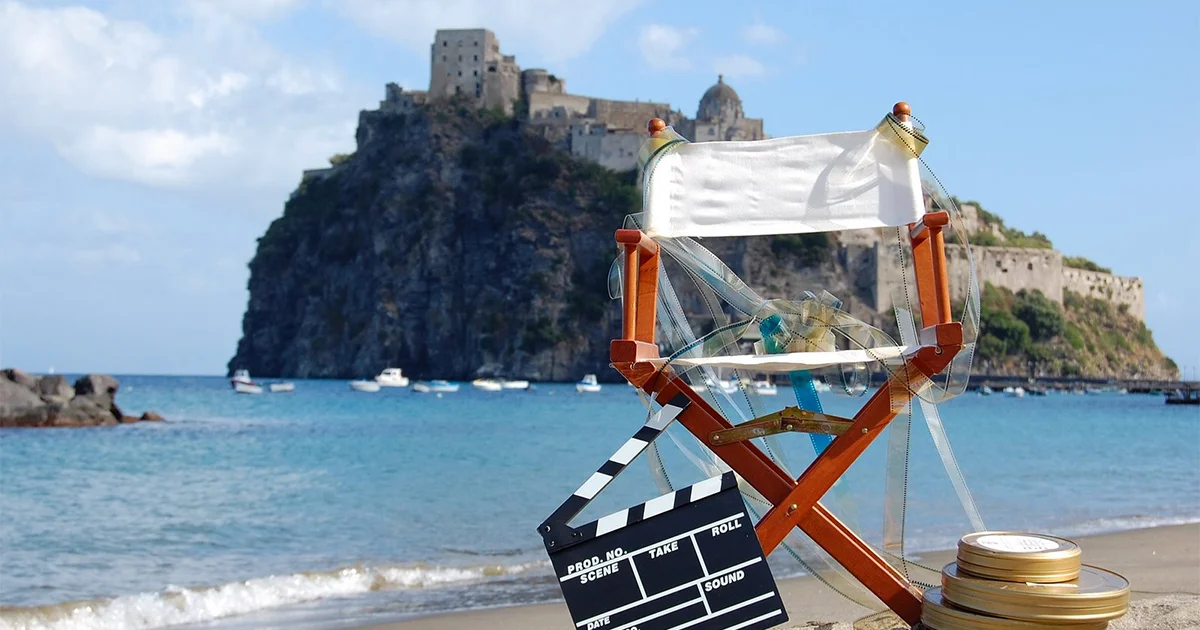 An open-air cinema screening at night on the scenic island of Ischia, Italy