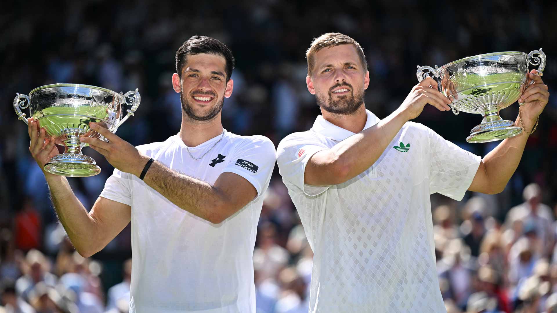 Men’s Doubles Champions Julian Cash & Lloyd Glasspool of the UK celebrate their historic title victory at the Wimbledon 2025 tournament.