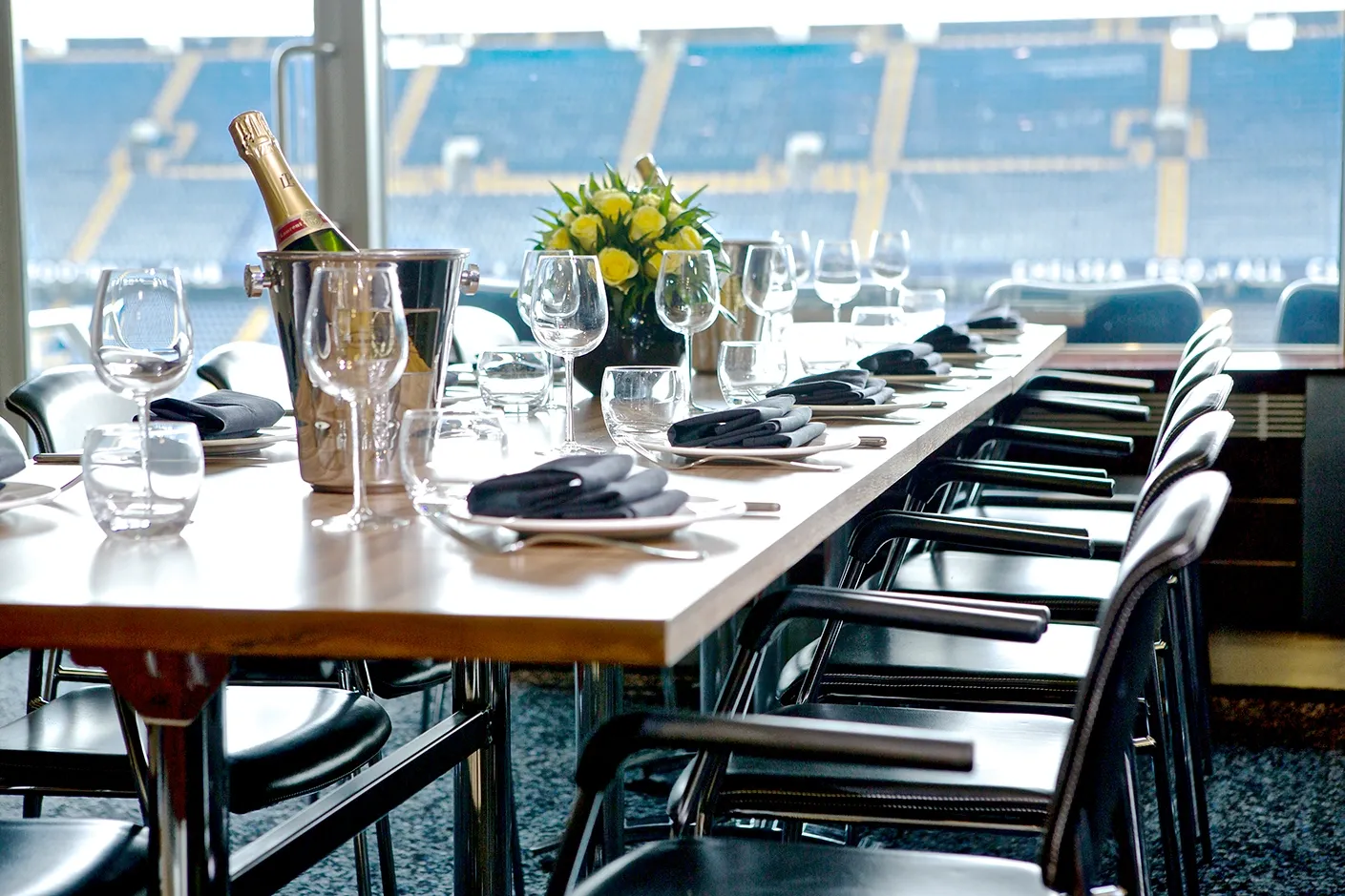 A luxurious and modern hospitality lounge with comfortable seating and elegant decor.