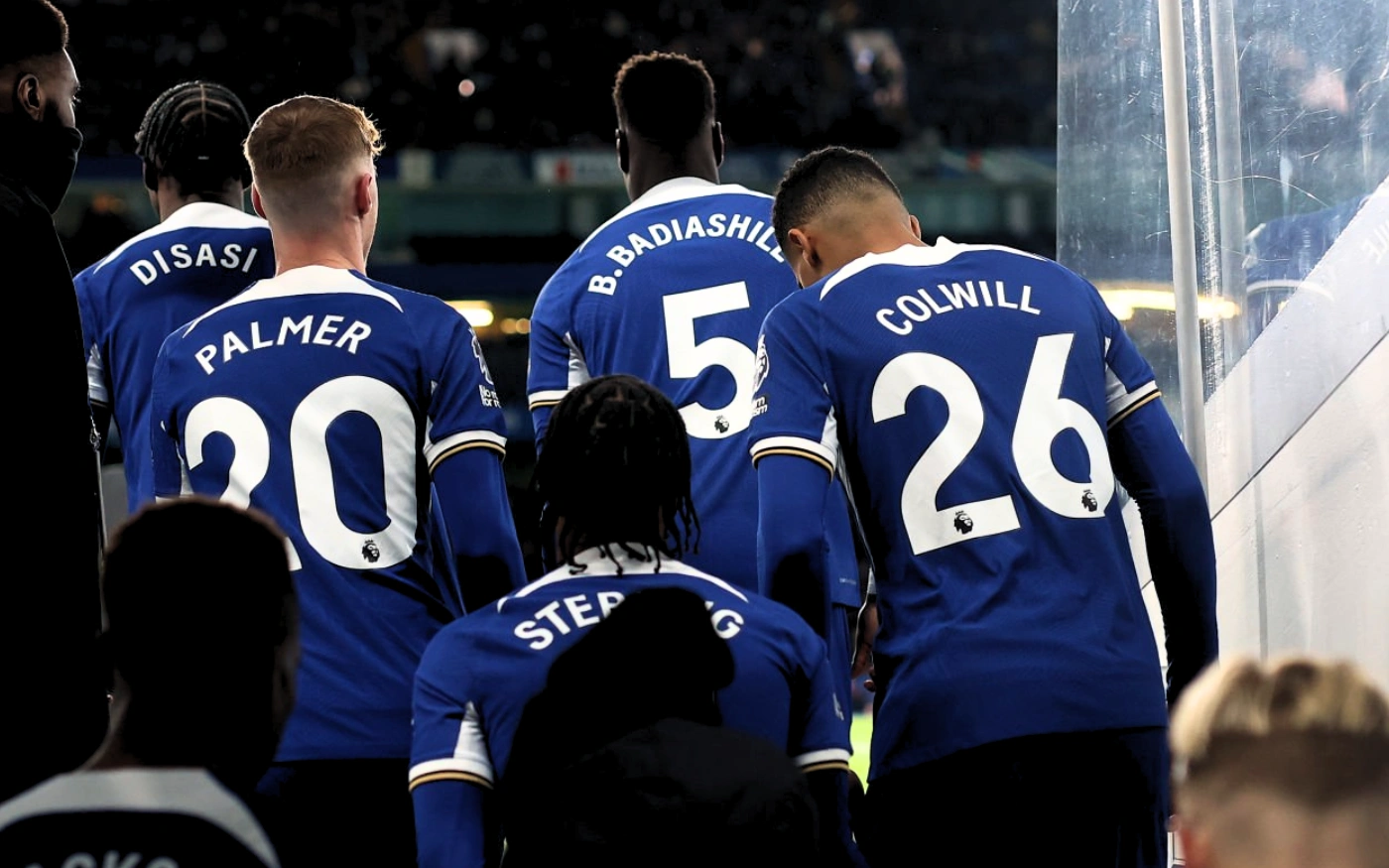 View from the players' tunnel leading out onto the bright pitch at Stamford Bridge.