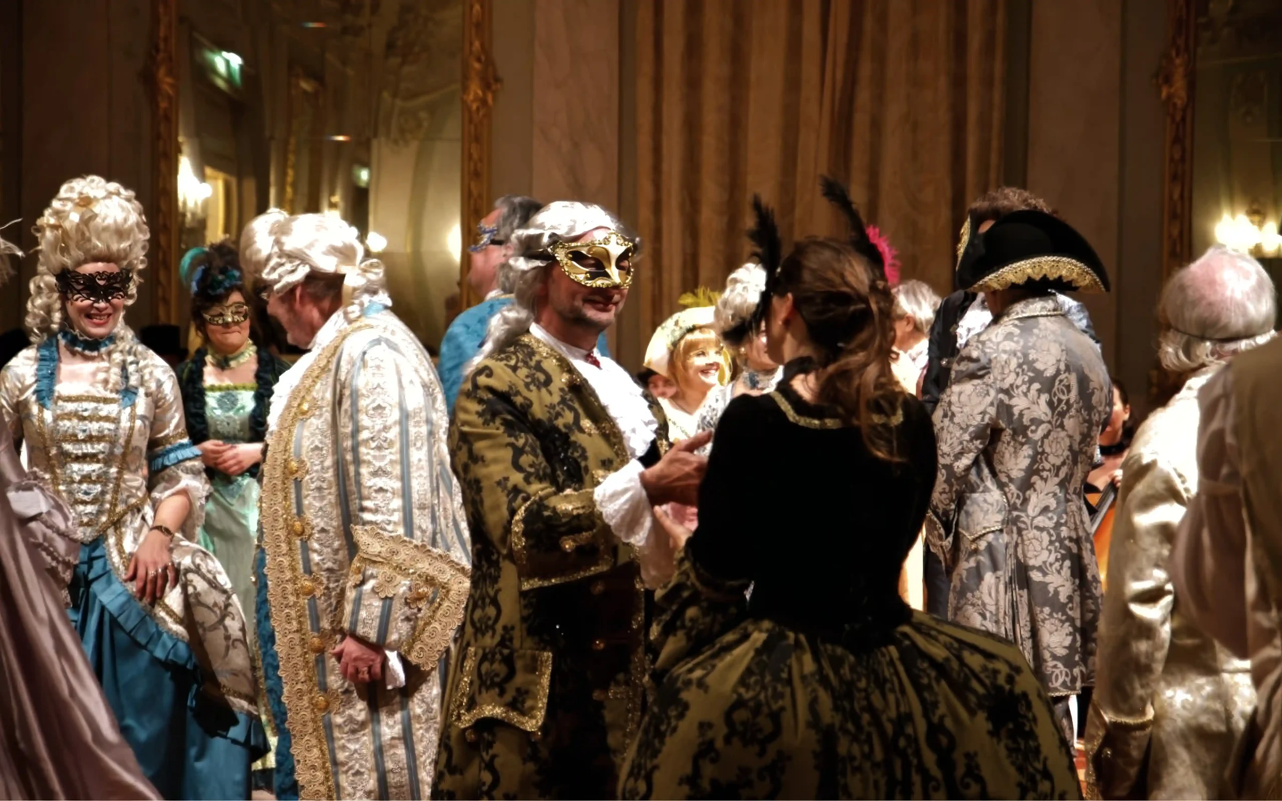 Elegant masked ball in a Venetian palace