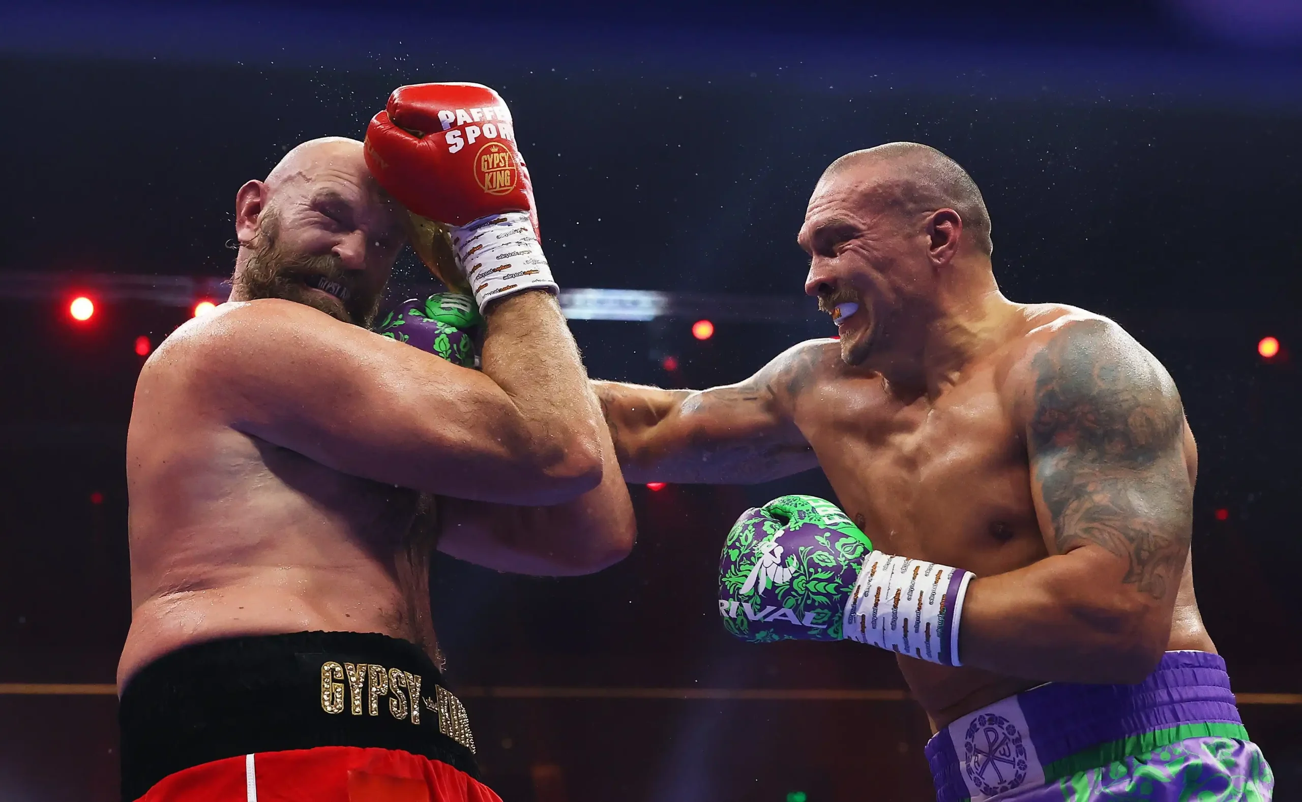 Tyson Fury and Oleksandr Usyk facing off before their fight.