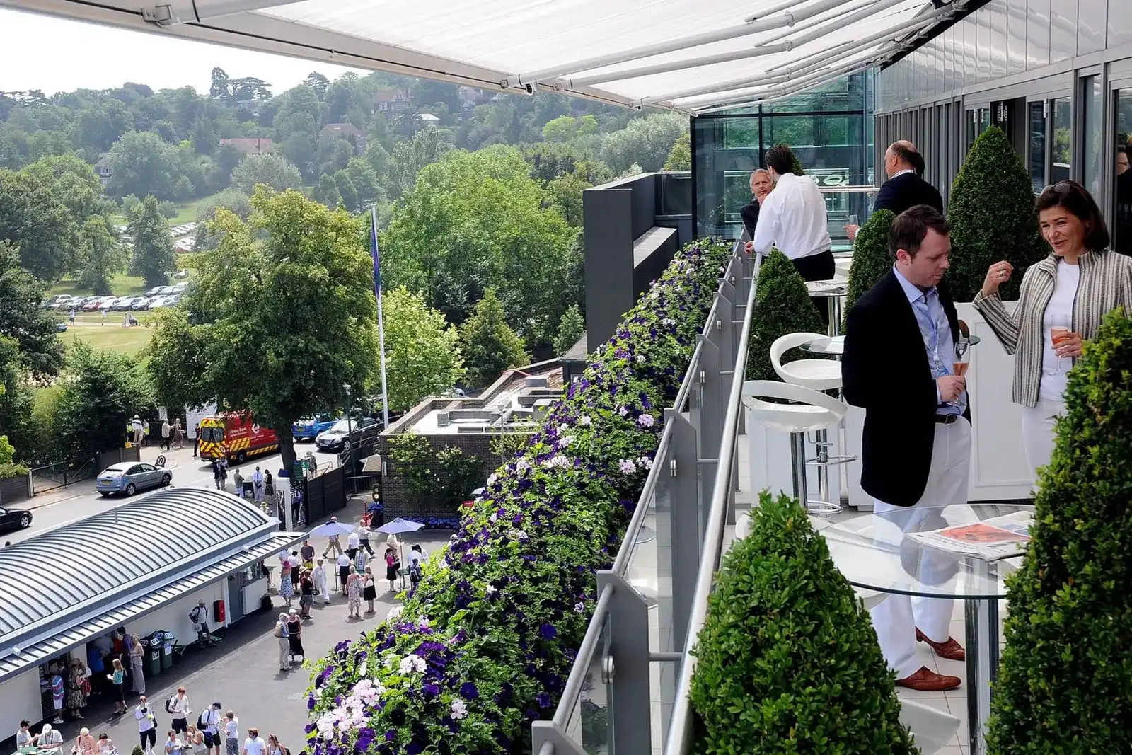 The private balcony of a Skyview Suite, offering a direct view of the crowds and courts below.