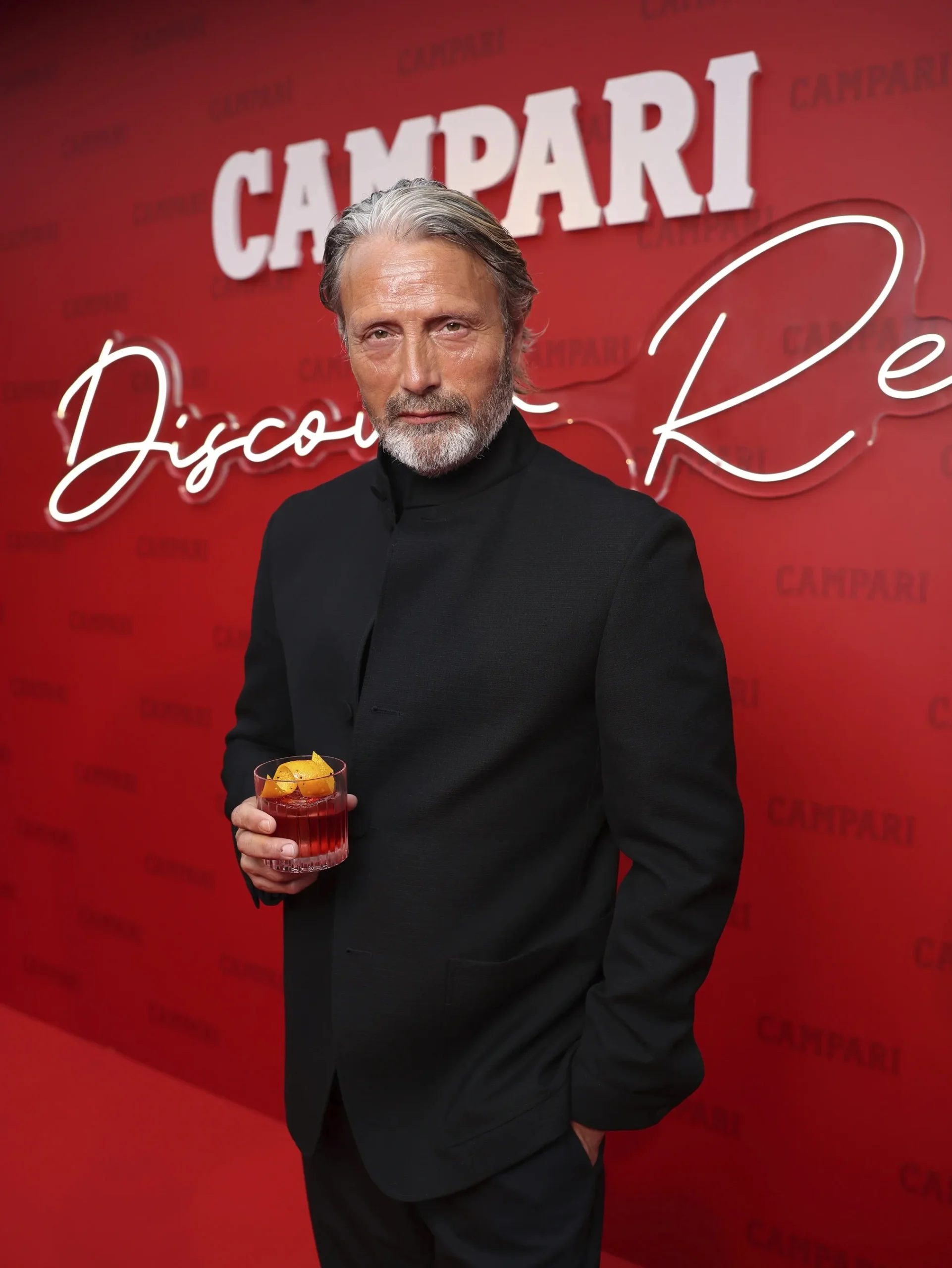 Immersive red lighting and cocktail theatre at the Campari Red Diaries Party, arranged by Above + Beyond.